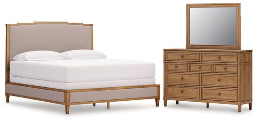 Sharlance California King Upholstered Panel Bed with Mirrored Dresser